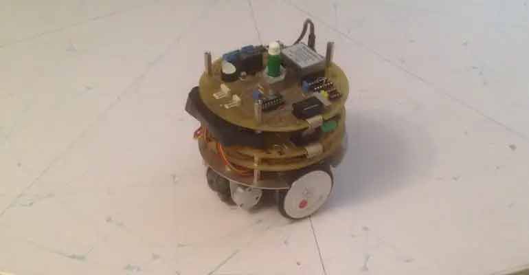 The coffee can size Tychoscope 1 with its outer shell removed reveling its circuit boards, wheels and motors.