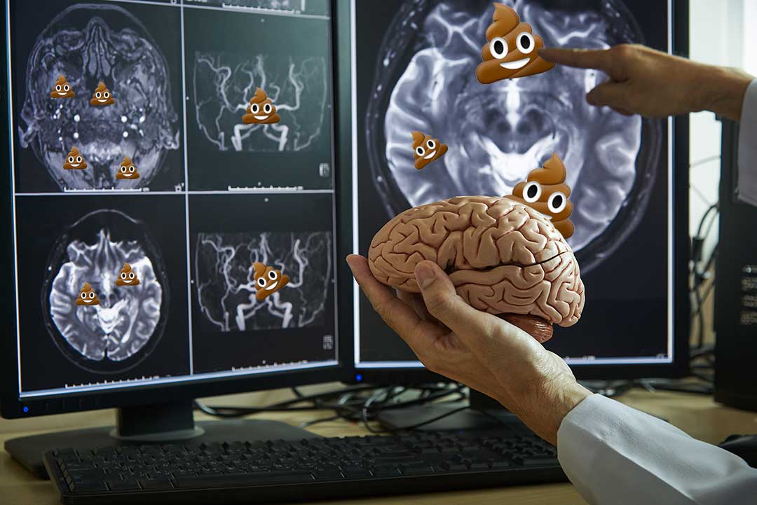 A “mindfulness” brain scan or x-ray with a doctor pointing to a poop emoji on the image of the brain. Mindfulness, like an X-ray, can reveal your mind to you.